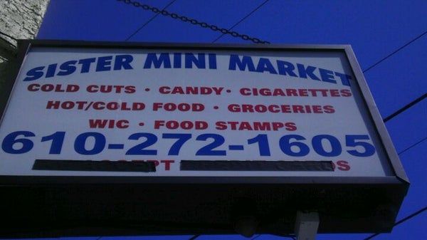 Sister Mini Market storefront sign on Arch Street in Norristown